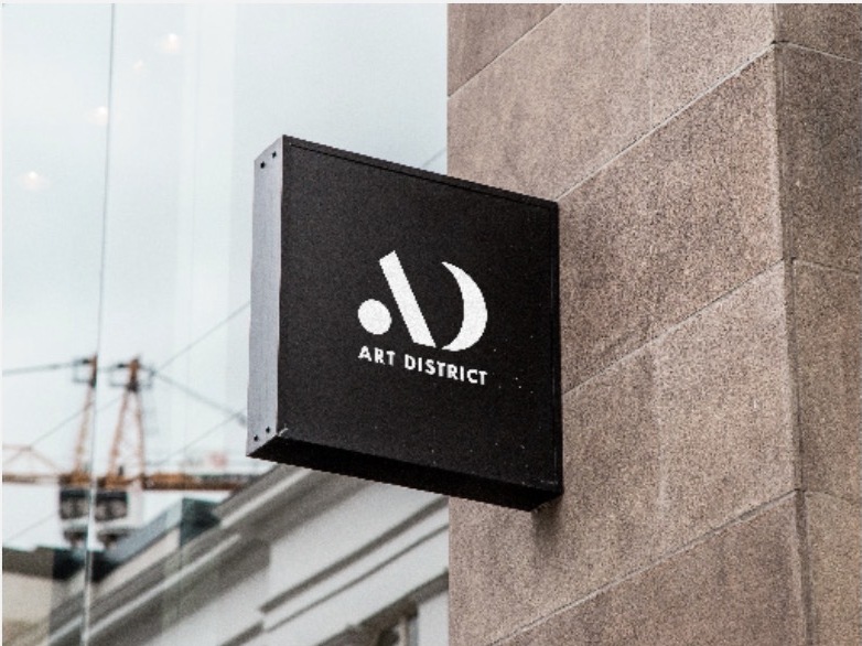 Aplicación de identidad Art District en señalética exterior